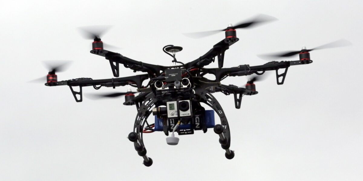 In this Feb. 13, 2014, photo, members of the Box Elder County Sheriff's Office fly their search and rescue drone during a demonstration, in Brigham City, Utah. Law enforcement, government agencies and others are itching to use drones for everything from finding lost hikers to tracking shifting wildfires. But privacy watchdogs are urging state legislatures to step in and head off any potential privacy violations. That tension is on display as more than 35 states consider drone legislation this year, according to the National Conference of State Legislatures. The bills include ways to attract an industry that could generate billions and restrictions on drone use and data collection. (AP Photo/Rick Bowmer)